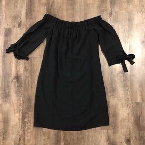 Classy off the shoulder little black dress.